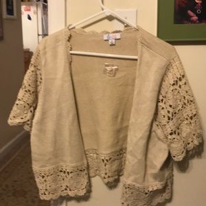 Cute summer sweater. Great way to hide arms!